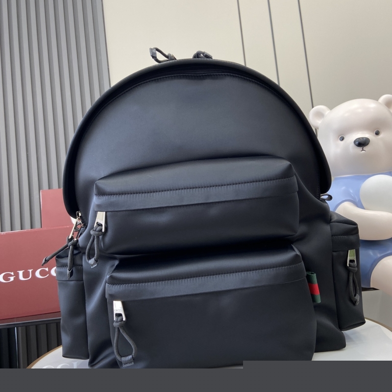 G*u*i backpacks